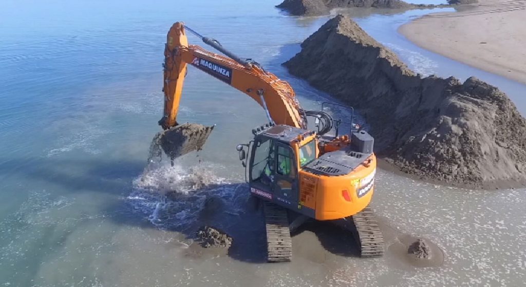 Doosan DX235LCR-5 Excavator Repairs Damage In Ebro Delta In Spain