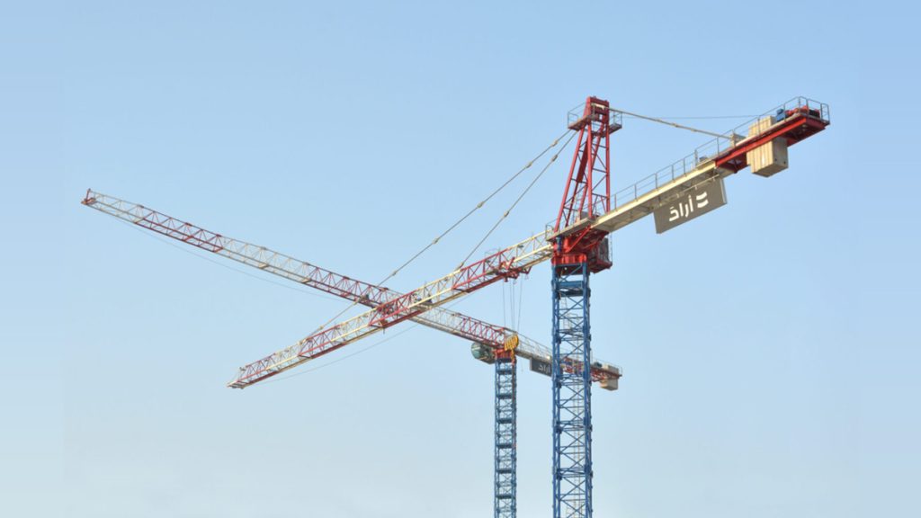 One Raimondi MRT294 flattop tower crane and one Raimondi ER240 hammerhead at work for the construction of Nest in Sharjah